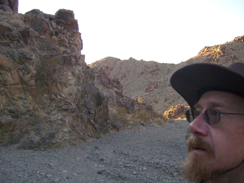 A few glints of hot yellow sunshine dart into Idora Mine Canyon as I hike back down