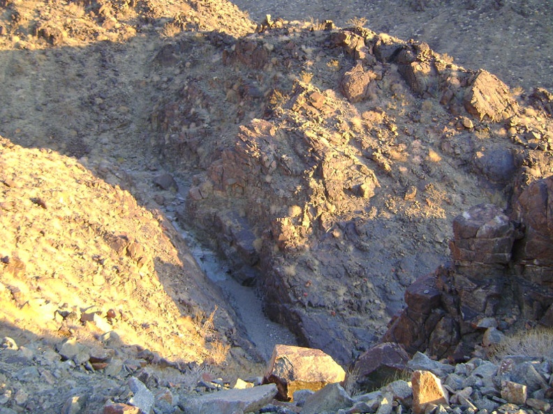 On the way down, I get a nice view down into the short slot canyon that I briefly explored on the way up