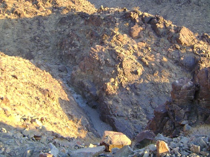 On the way down, I get a nice view down into the short slot canyon that I briefly explored on the way up