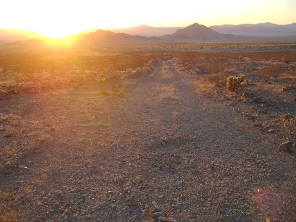 Enjoying the sunset to the left of Cowhole Mountain as I walk down the bottom of the road from Idora Mine Canyon