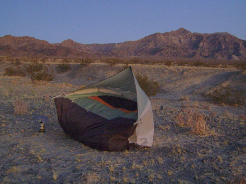 I arrive at my tent to find that strong Devil's Playground winds have blown it during the day over while I was out hiking!