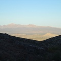 It's about 30 minutes before sunset, perfect time to be climbing a big hill in the Mojave Desert