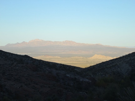 It's about 30 minutes before sunset, perfect time to be climbing a big hill in the Mojave Desert