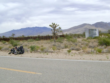 On the way down the Cima Road hill, I stop at an old corral and water tank