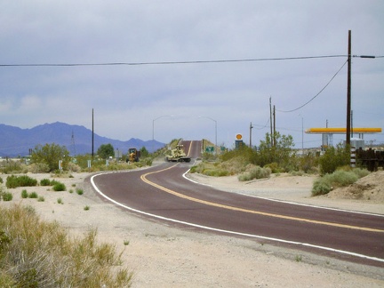 Cima Road rises up to a bridge that crosses over Interstate 15 and I stop at the gas station store here to fuel up on supplies