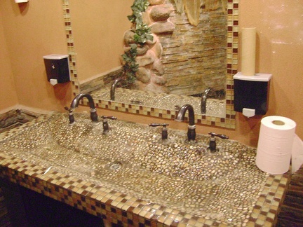 The washroom sink at the Valley Wells gas station matches the urinal in its unique epoxy tackiness