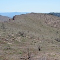 A glance  to the west shows how the slope up the back of Pinto Mountain ends abruptly at the steep escarpment