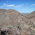 I take a break on a hill on Pinto Mountain at about 5870 feet elevation, munch on an energy bar and enjoy the views