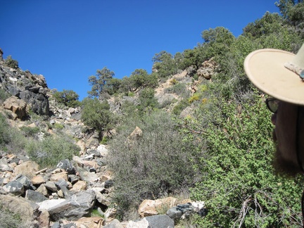 It doesn't take long to reach the bottom of the rock pile where it spills out onto the edge of Cedar Wash