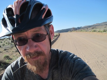I ride two miles on Black Canyon Road on the way back to Mid Hills campground, Mojave National Preserve