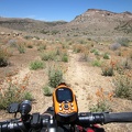 The "Shortcut Road" is only 3/4 mile long; soon enough, I'm approaching Cedar Canyon Road, that horizontal line ahead