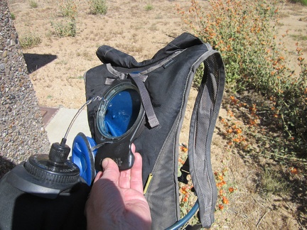 Before I leave the Bert Smith Rock House and ride over to Pinto Valley, I refill my Camelbak