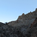 A half-moon looks down at me while hiking Piute Canyon