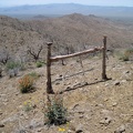 I decide to hike along the ridge toward nearby Hill 1625 in the Providence Mountains and cross through an old ranch fence