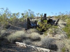 I take a look at some crumpled structure remains near Rattlesnake Mine before continuing my bike ride