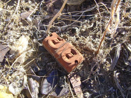 I check out one of several debris piles at Rex Mine and find an ornate electrical socket
