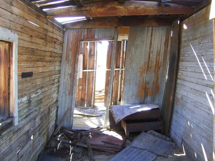 This boxcar cabin at Rex Mine leans to one side, anxious to collapse one day
