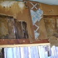 A closer look at the wallpaper, cardboard, and wallpaper interior at the Rex Mine boxcar cabin