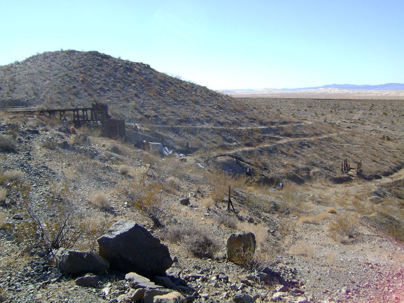 A gently switchbacking road winds up the hill to the Rex Mine ore bin