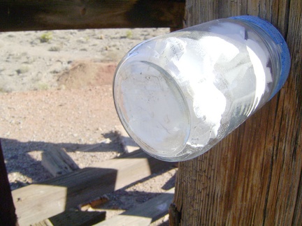 Attached to one of the timbers is bottle containing mining claim papers