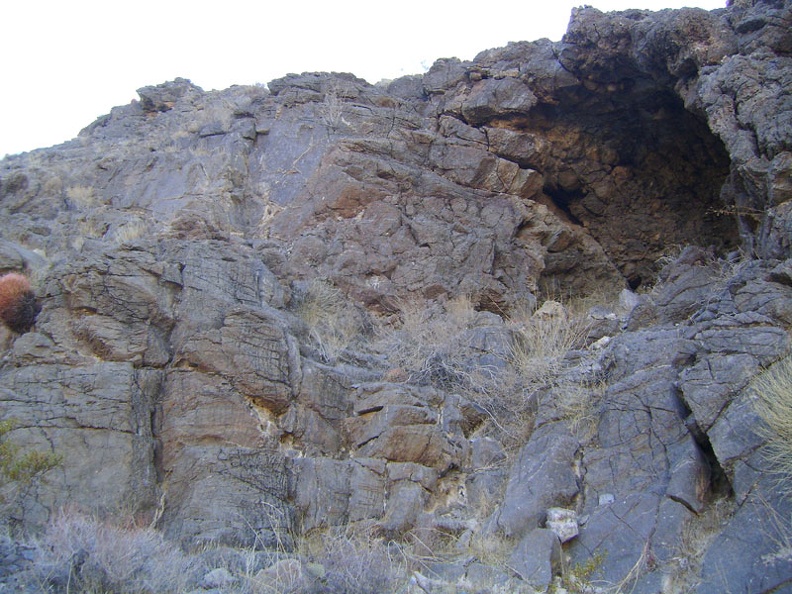 I stop to look back up at the cave as I carefully climb down the hill