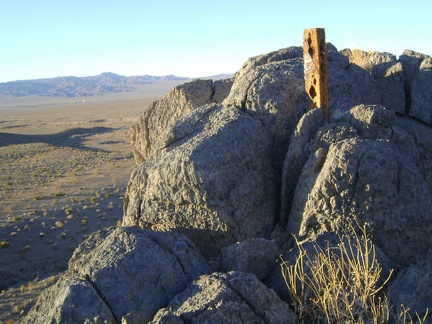 Atop the rooster comb is another claim or survey marker