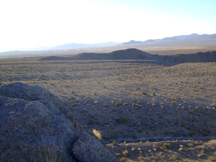 I linger for a few minutes on the rooster comb to take in the view over to Rex Mine, Kelso Dunes and far beyond