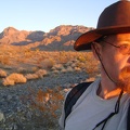 Catching the last hot-red rays of sunset as I walk down Rex Mine Road, with the Providence Mountains behind me