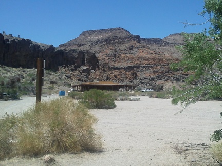 As I start down the Rings Trail, I take a look back at the Hole-in-the-Wall Visitor Centre, where I've locked my bicycle