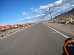Riding east on Route 66 away from Daggett, one of many long freight trains passes by