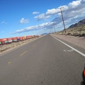 Riding east on Route 66 away from Daggett, one of many long freight trains passes by