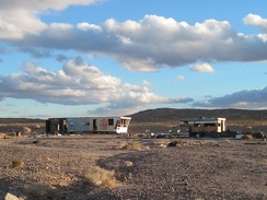 It looks like these two abandoned and semi-demolished trailers near Route 66 east of Newberry Springs have been visited often
