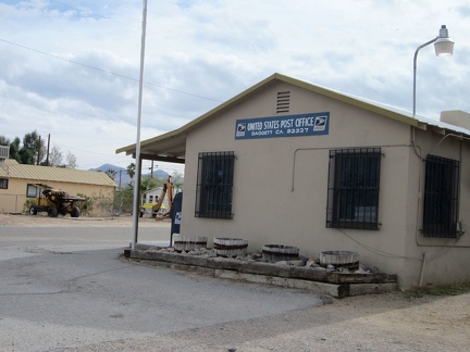 The Daggett post office is decorated with heavy bars on its windows