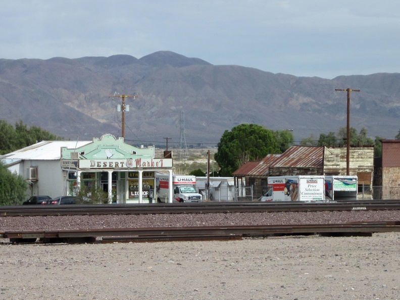 On the other side of the train tracks from Route 66 is Daggett's general store, the Desert Market