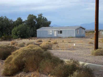 This prefabricated house in east Newberry Springs has no front steps