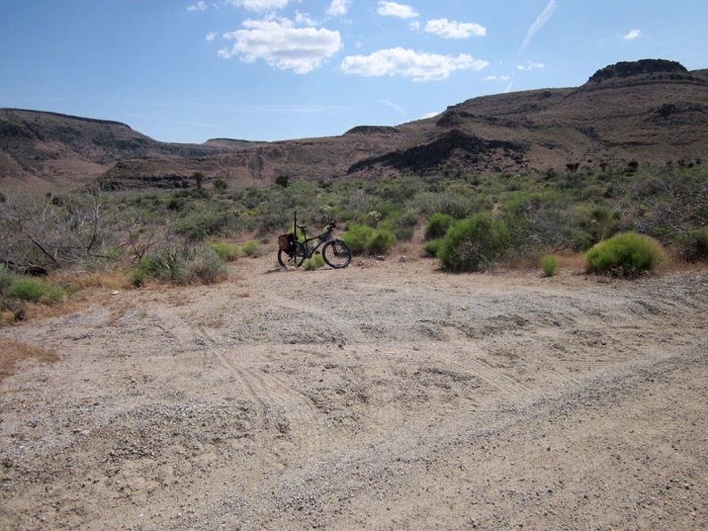 I pull over at a turn-out on Wild Horse Canyon Road, stash the bicycle in the bushes and begin the hike