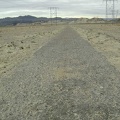 Some of the old pavement on the power-line road still functions as originally intended