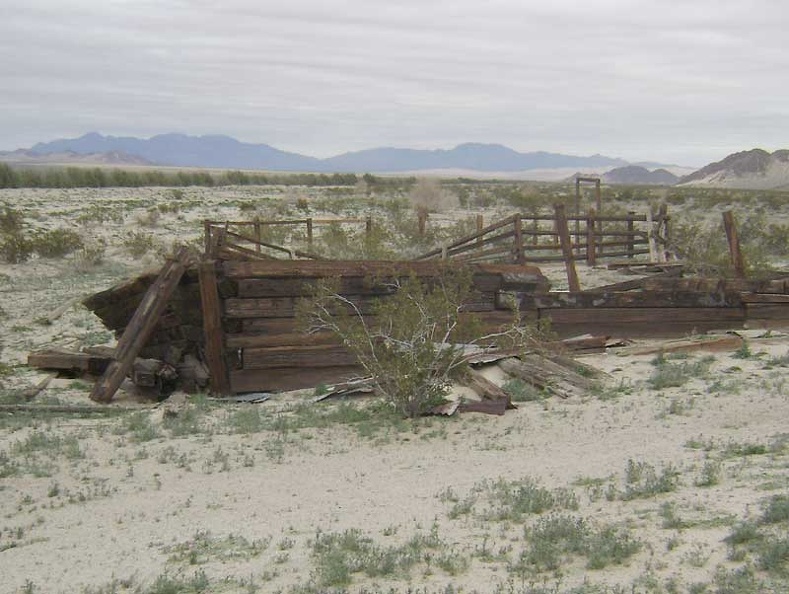 On the other side of the corral crumbles part of an old wall