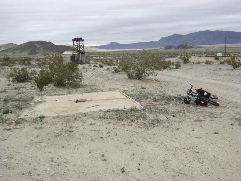 I see just one extant structure at Sands: a shed next to what looks like part of an old water tower