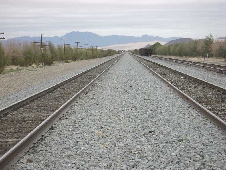 I'm not seeing new points of interest along the service road, so I cross the tracks and ride back up to Sands