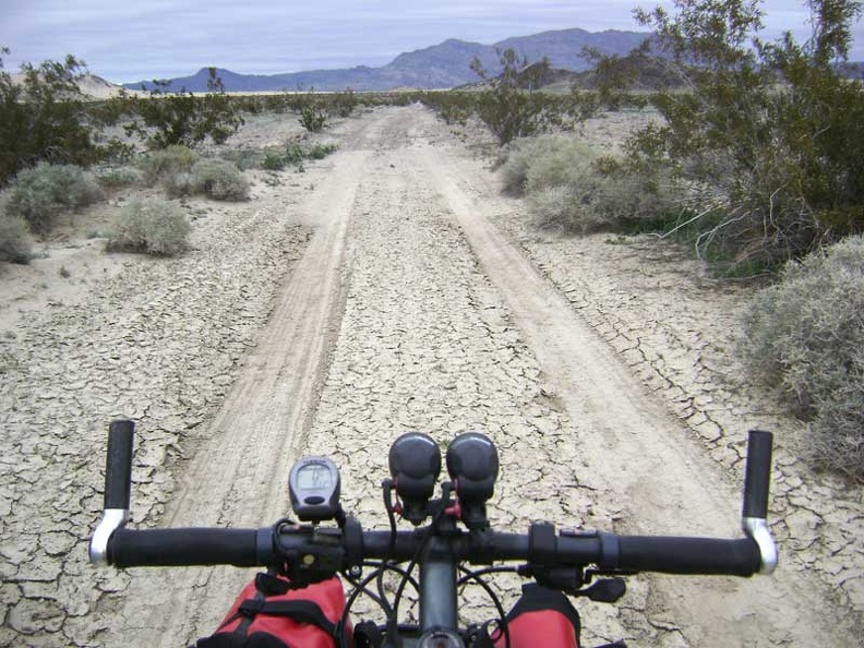 Crossing a dry mud flat near Sands on the way back across Devil's Playground