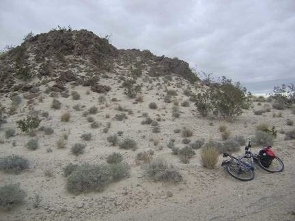 One of the rocky hills along the road tempts me, so I get off the bike and climb up it