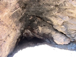 Closer inspection of the little cave shows smoke stains on the roof