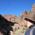 I study my maps a bit and backtrack a quarter-mile up the canyon before turning right and climbing over a rocky ridge