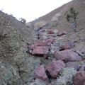 Climbing out of the sandy wash, a few big rocks, and a lot of small ones