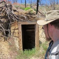 I take a look into the old entrance to the Bluejay Mine before I start climbing up the hill