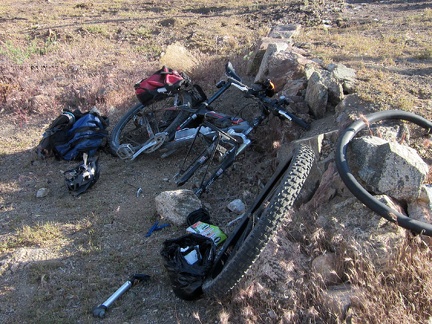 I arrive back at my bike by the old Winkler's Cabin site by Bluejay Mine and find that it has a flat tire