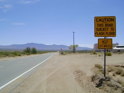 I turn south on Ivanpah Road and am welcomed by this flash-flood warning sign