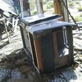 Old refigerator in the back porch of an abandoned house at Cima, Mojave National Preserve