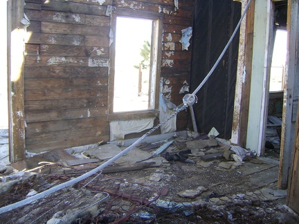 Inside one of the rooms of the collapsing house at Cima